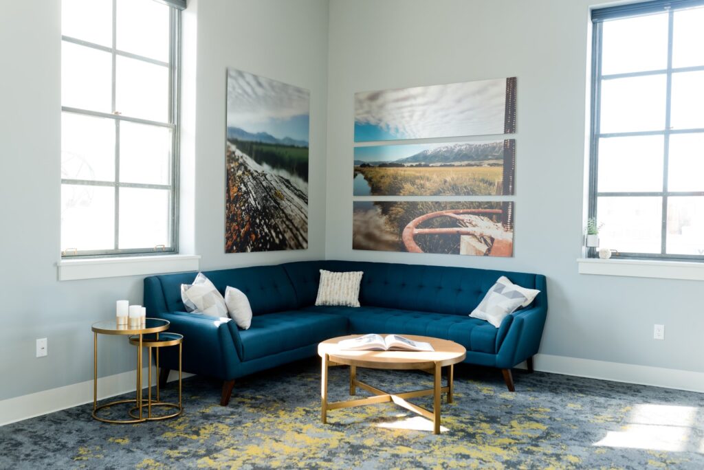 Blue corner sofa with coffee table