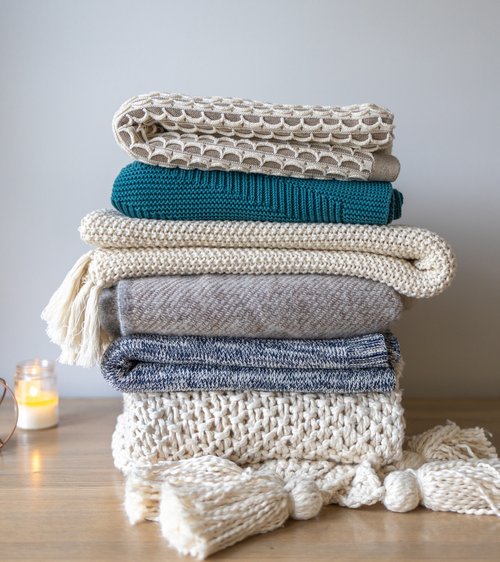 Cosy throws piled up 
